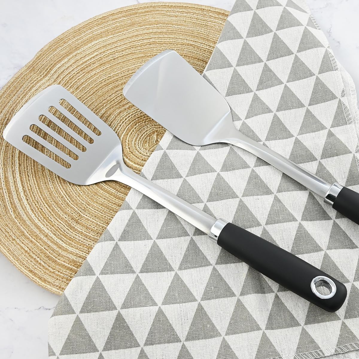 MUJINON 14.3-in spatulas ideal for stainless steel and cast iron.