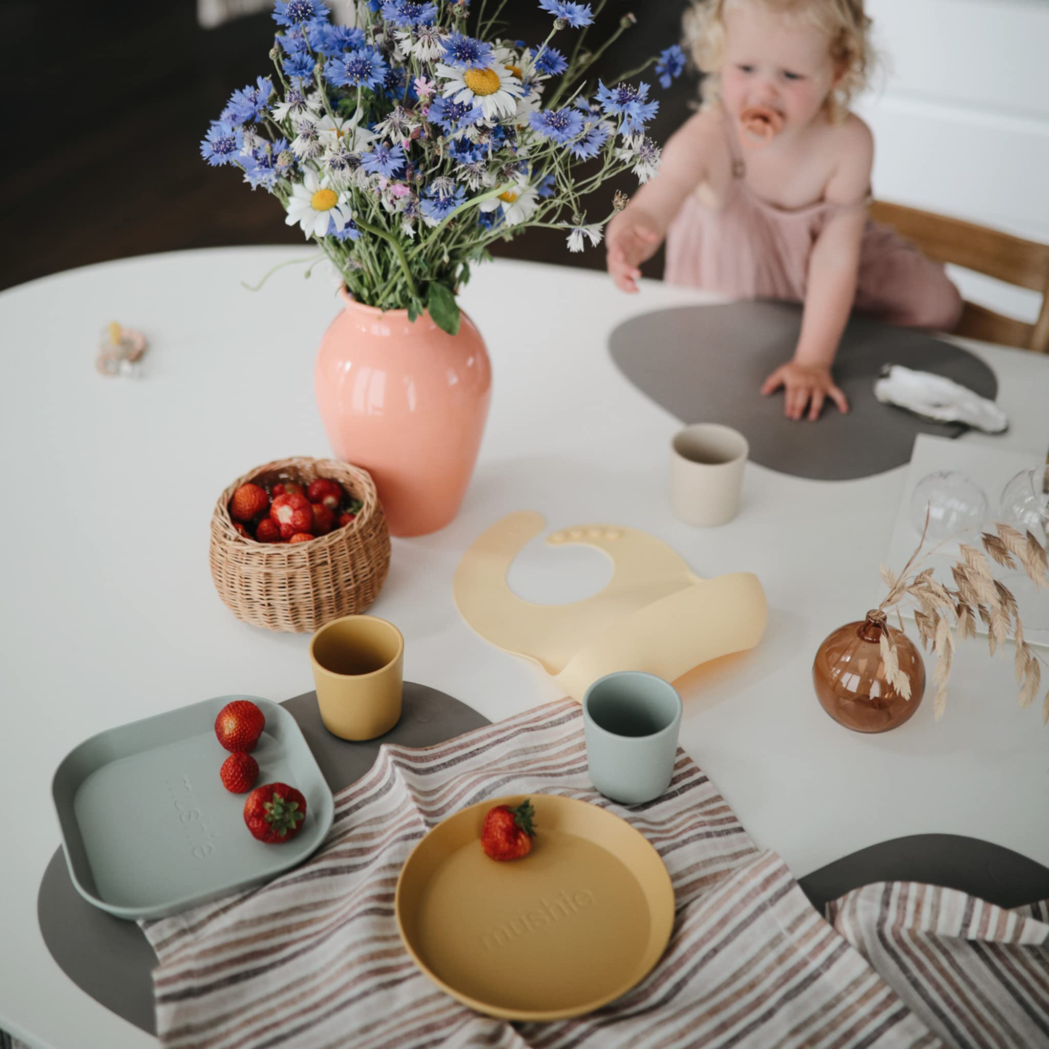 Mushie ivory cups with 225 ml capacity for kid friendly portions.