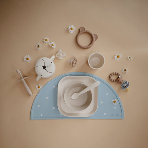 Mushie ivory cups are dishwasher safe for quick cleanup after meals.