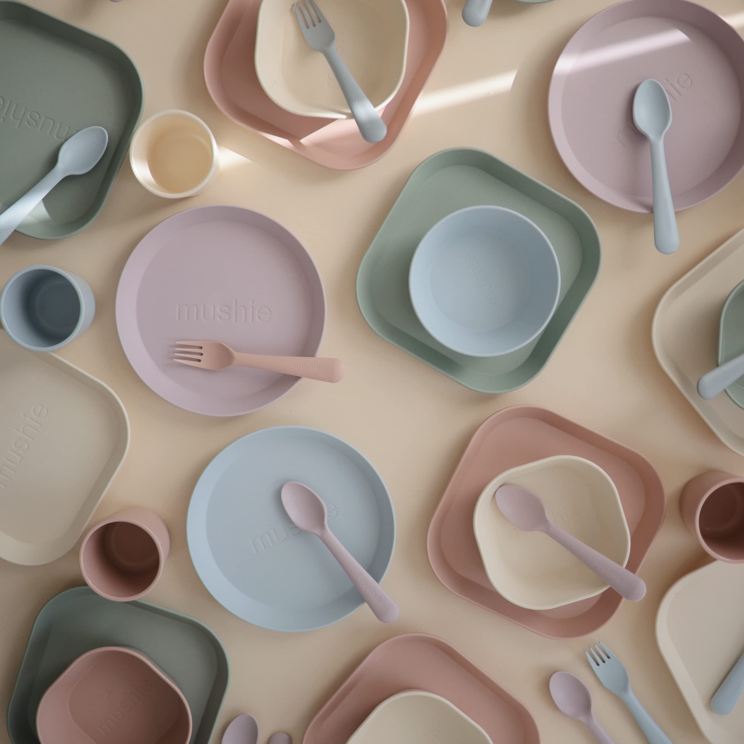 Mushie set of 2 adds coordinated color to your table.
