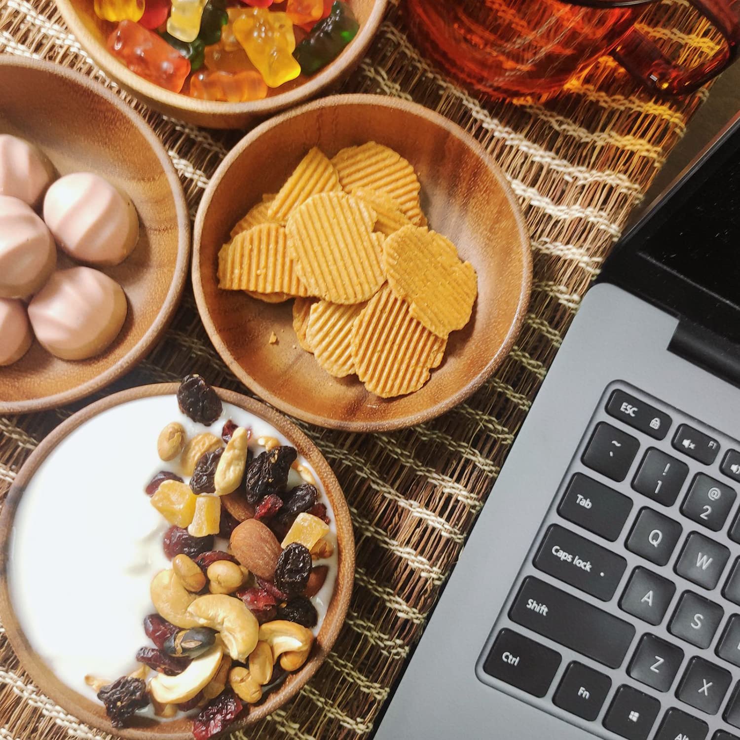 Muso Wood table-ready serving bowls elevate casual dinners with warm natural texture.