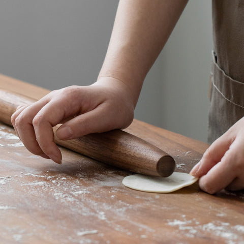 Muso Wood walnut grain details emphasize natural character and premium construction.