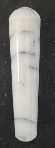 Close-up of smooth marble texture ready for fine grinding of seeds.