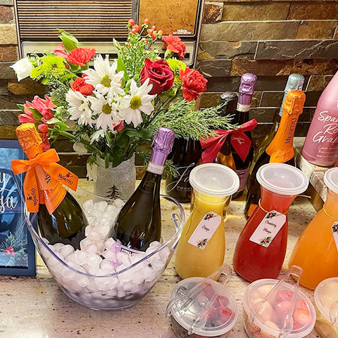 mwellewm wedding bar side setup shows elegant clear buckets for guests