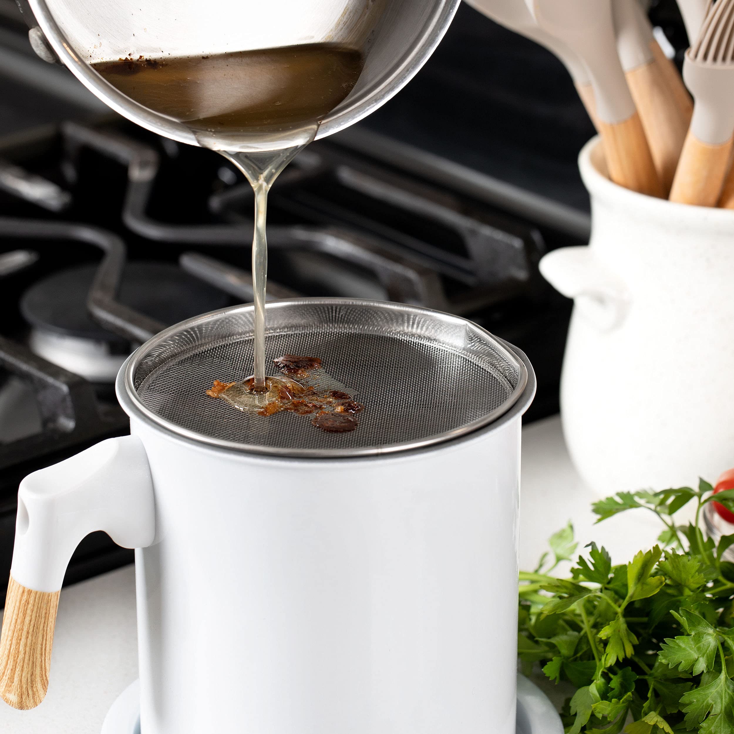 MYMOON HOME bacon grease container side handle demonstrates flow friendly pour and secure grip.