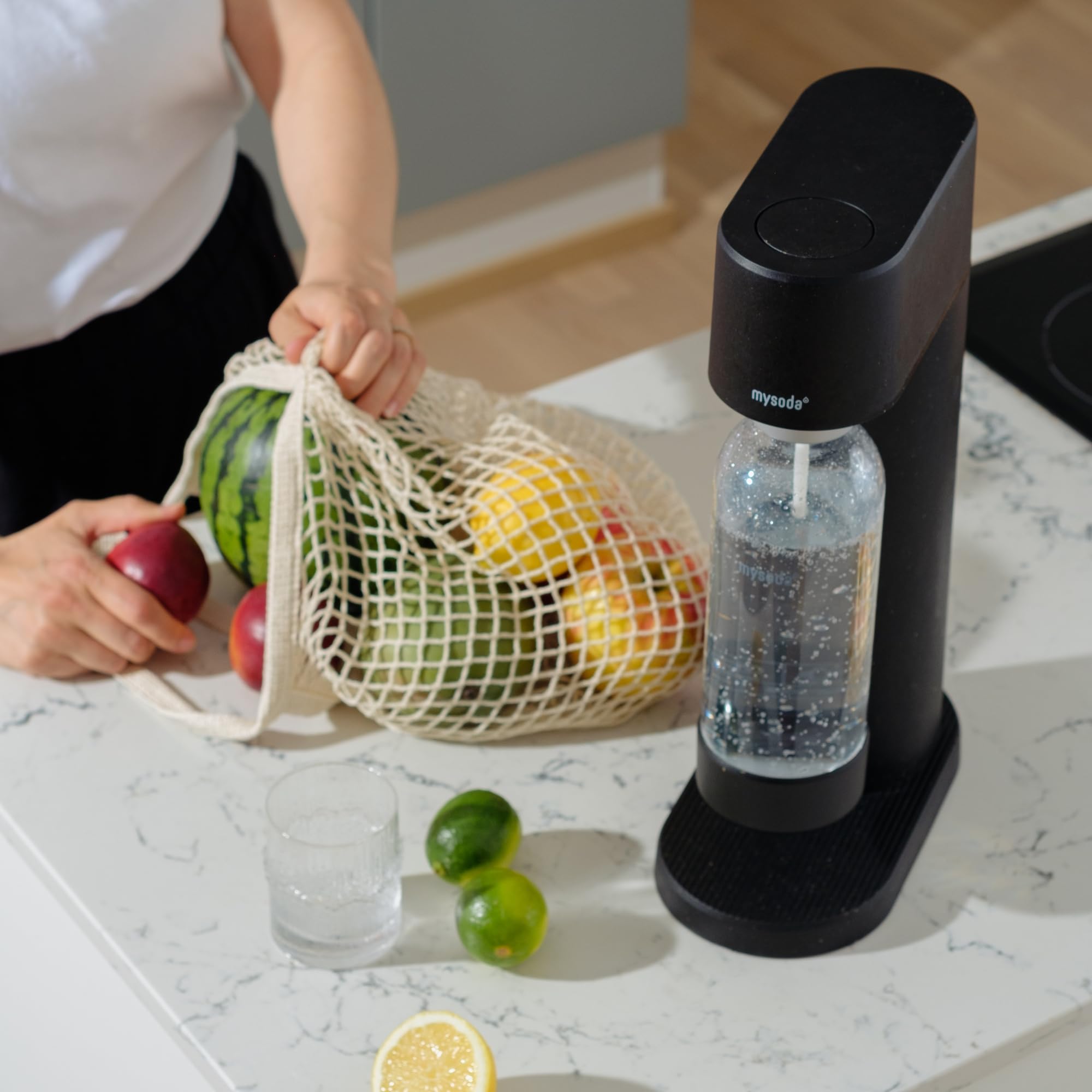 Mysoda bottle with wood composite base and lid for a sustainable, stylish fizz.