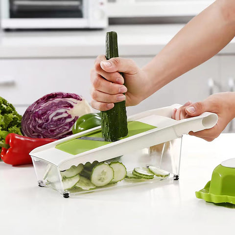 NACOLUS container captures sliced produce for easy transfer to pots.