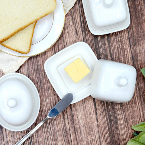 NAGU handled butter dish enables easy serving at meals