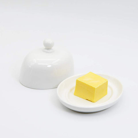 NAGU white porcelain dome butter dish keeps butter protected.
