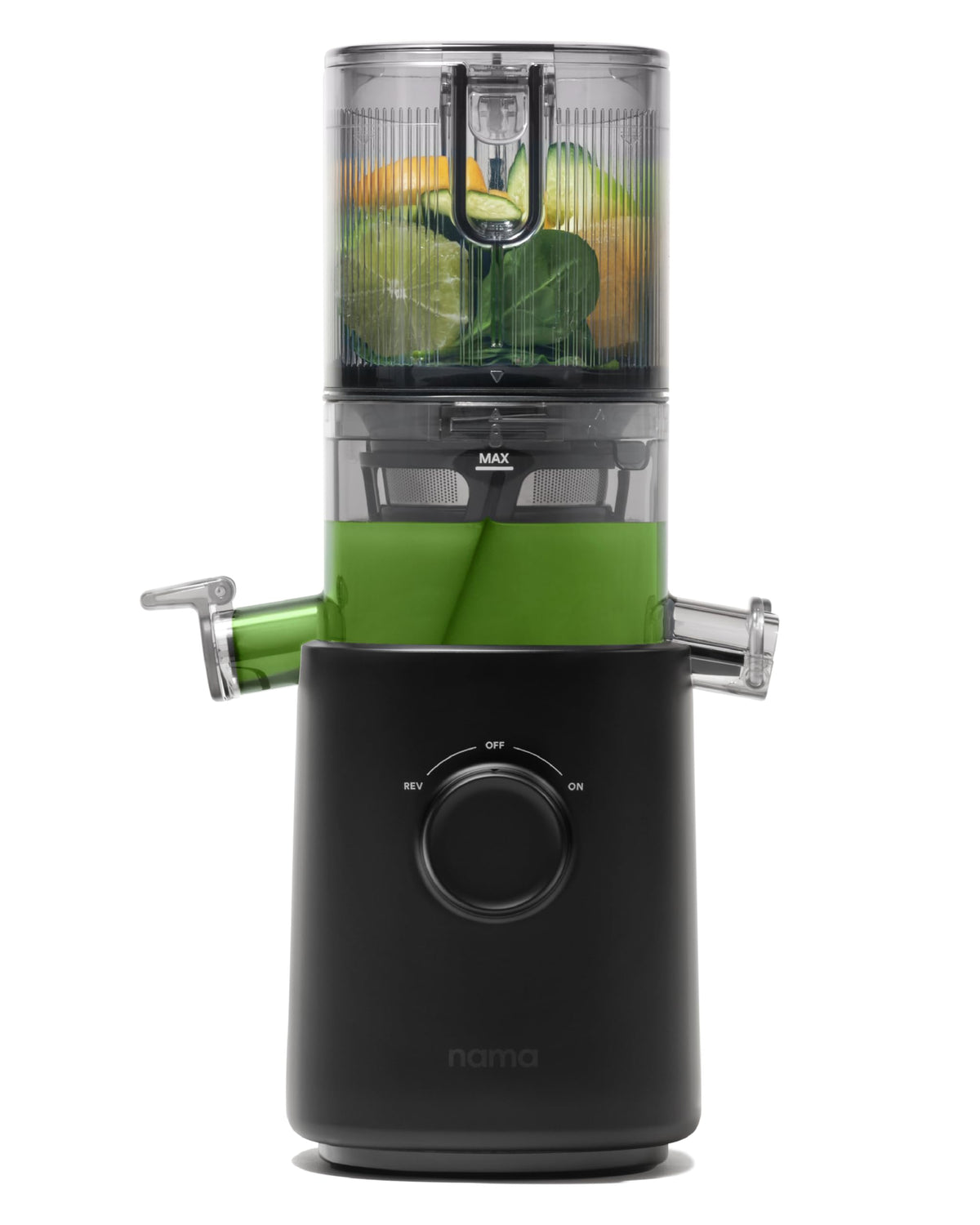NAMA J3 compact juicer hopper-loading demonstrates space-saving design for small kitchens.