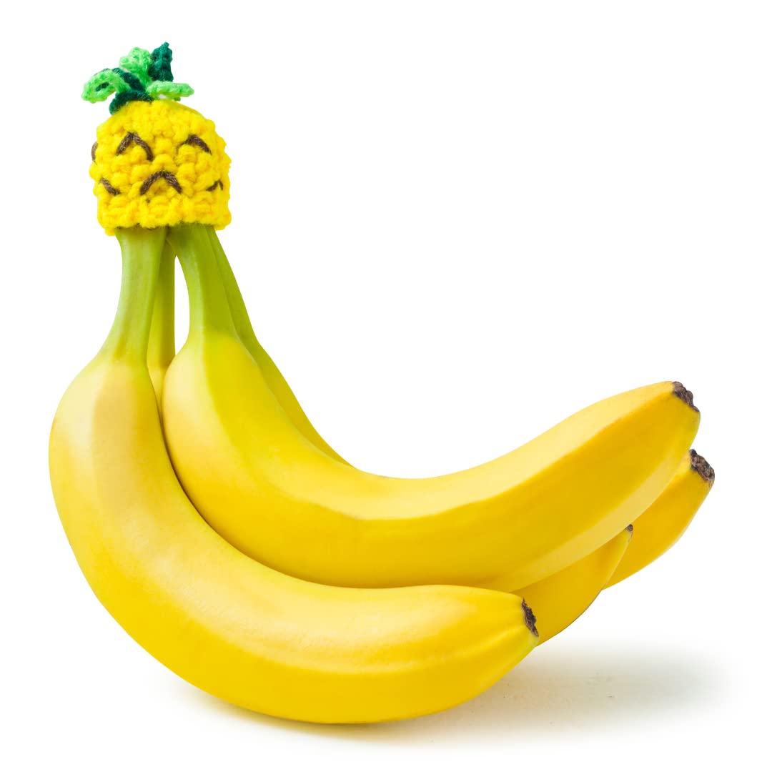 NANA HATS banana holder on counter organizes fruit while enabling quick, convenient access.