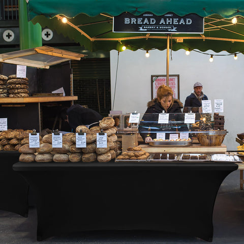 Wrinkle-resistant Nasitos table cover stays smooth through busy event setups.