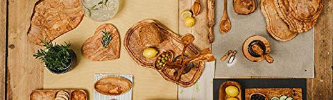 Naturally Med olive wood corner spoon highlighting Tunisian craftsmanship for stirring sauces.