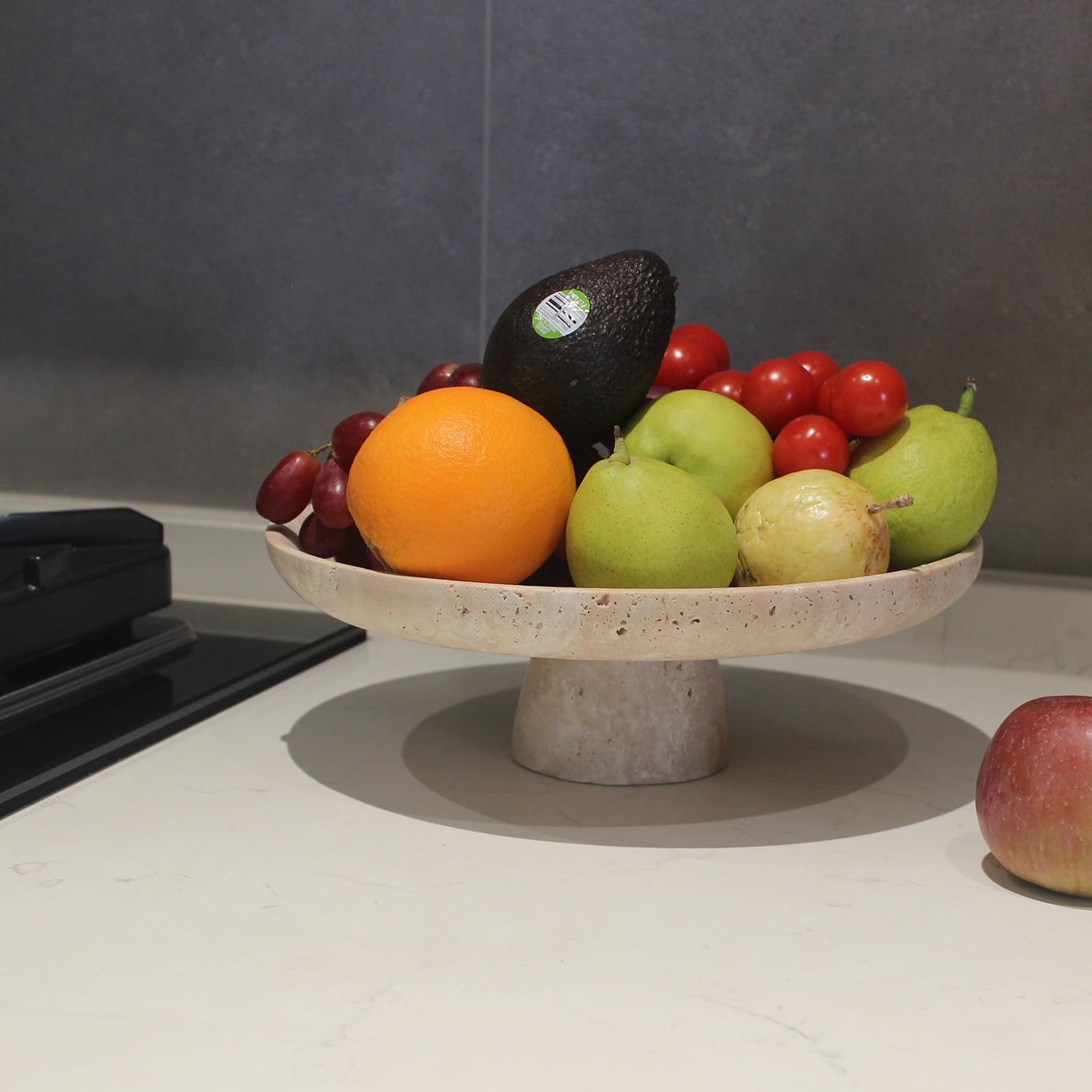 Nawgnail travertine bowl doubles as a storage tray