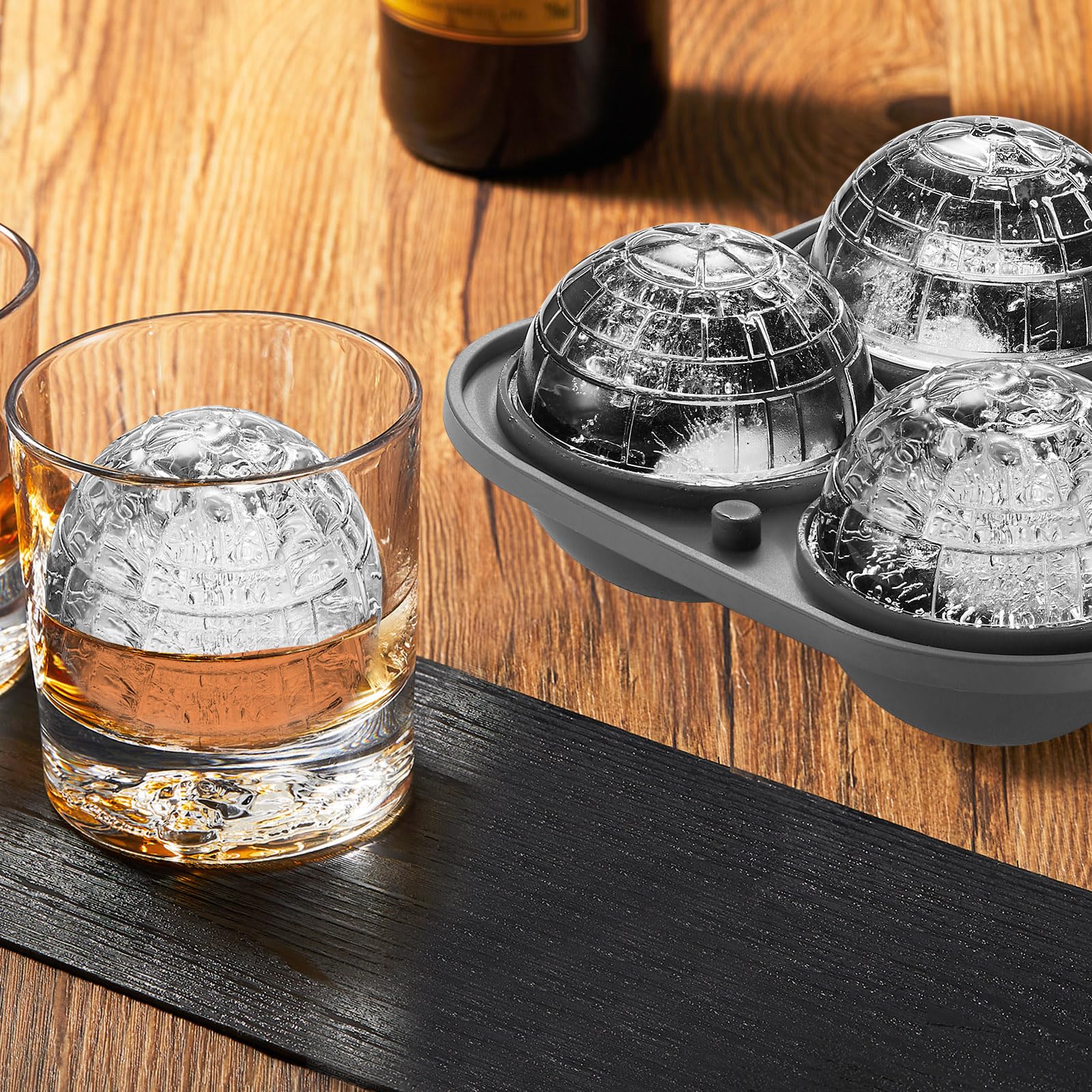 Nax Caki large sphere ice ball mold keeps drinks cooler longer.