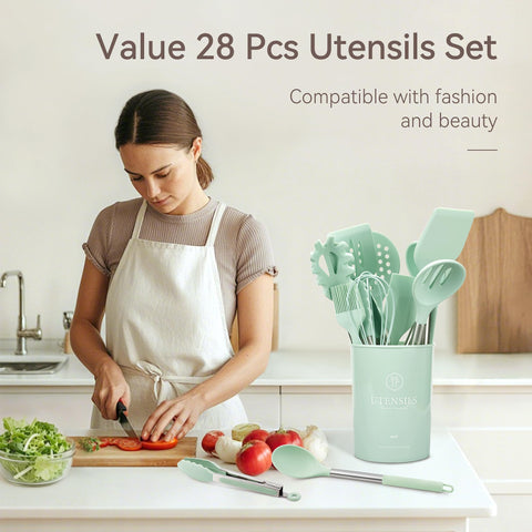 NCUE heat-resistant utensils in a hot pan showing 446°F tolerance