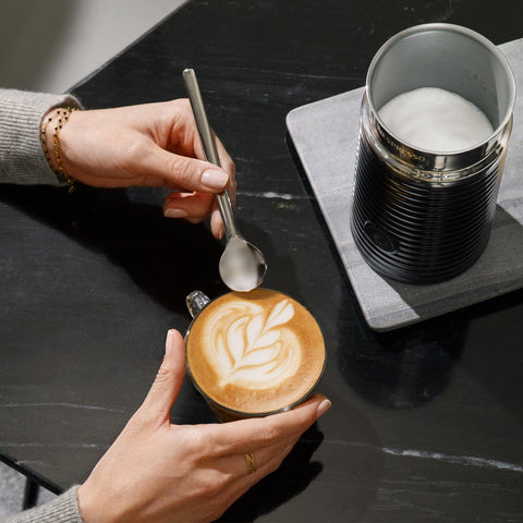 Nespresso Aeroccino 3 base shows slim footprint and automatic shut-off for simple, safe operation.