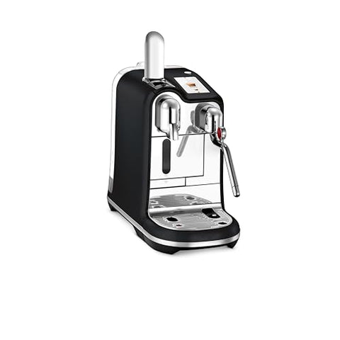 Nespresso Creatista Pro with milk texturing wand for cafe-quality microfoam at home.