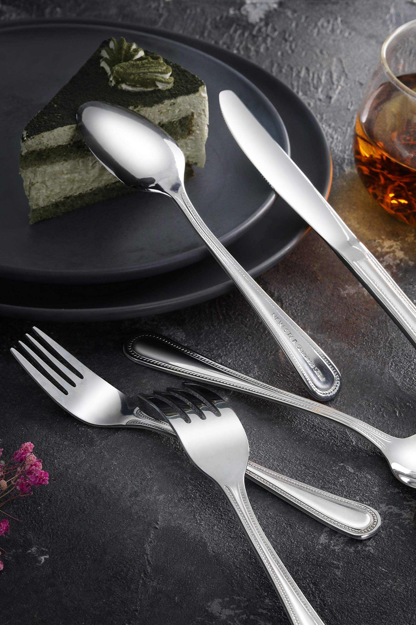 Side view of New Star 8/0 Teaspoon, sturdy feel in hand.