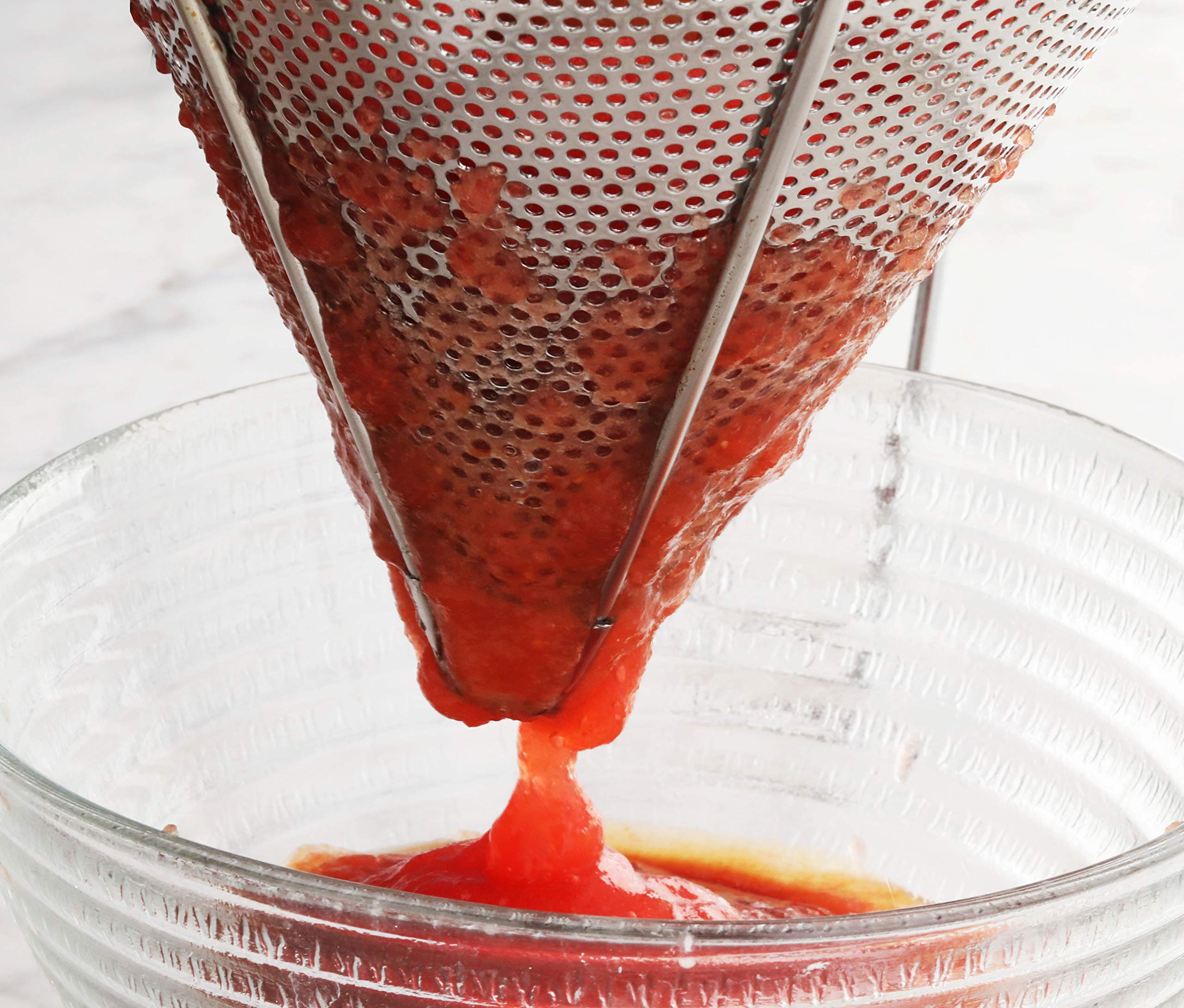 New Star Foodservice 42566 press through mesh with the included pestle.