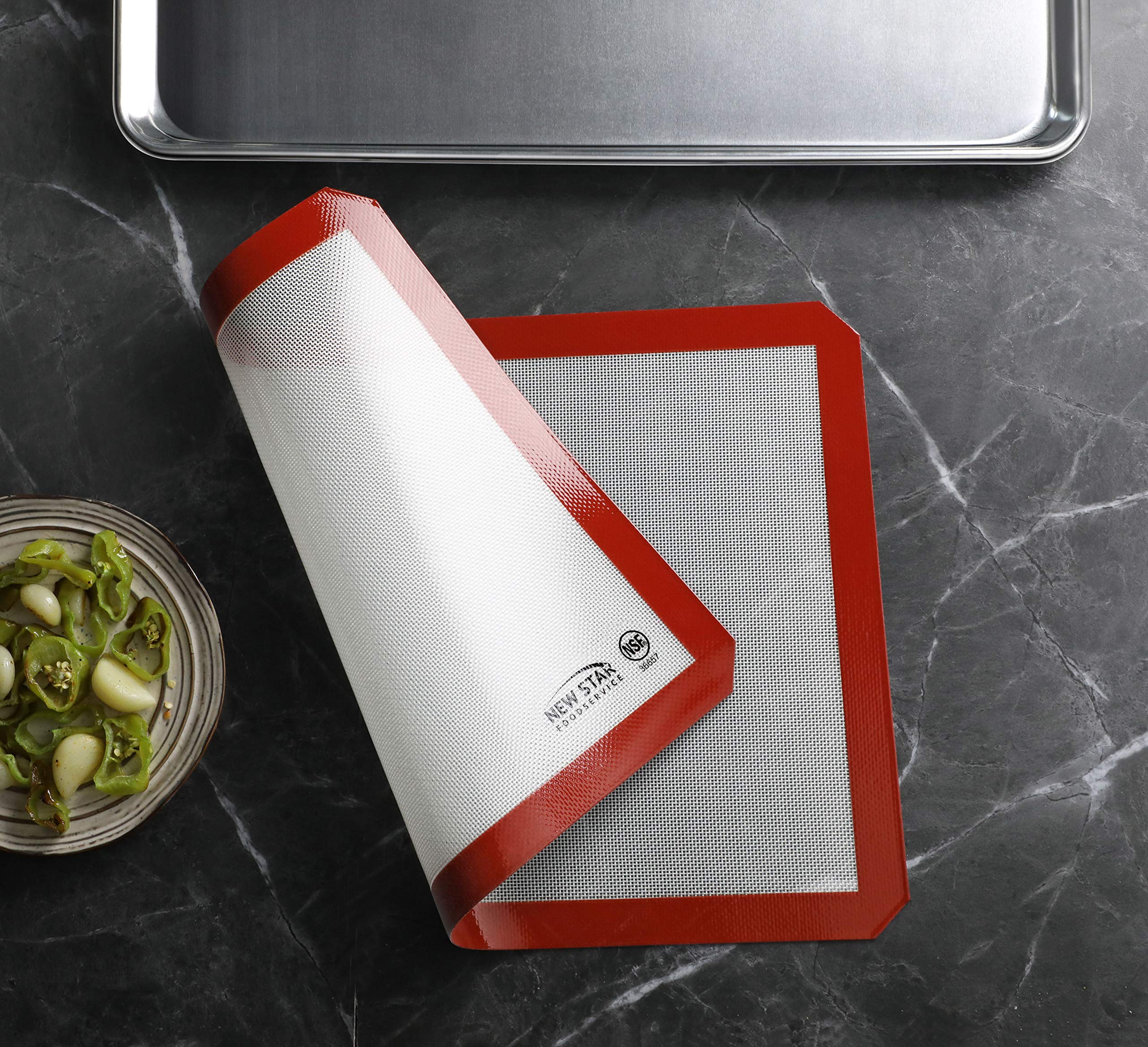 New Star Foodservice 14x20 silicone baking mat fits standard sheet pans.