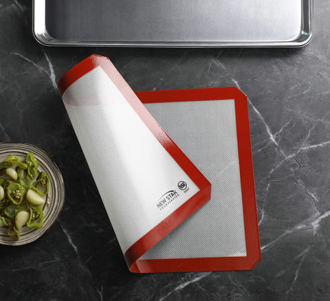New Star Foodservice 14x20 silicone baking mat fits standard sheet pans.
