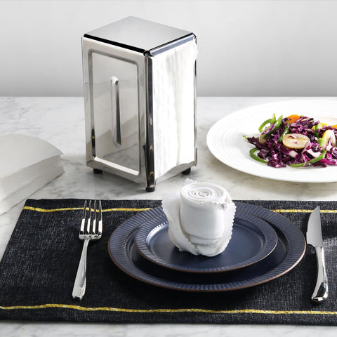 New Star Foodservice napkin dispenser with non-slip rubber feet on a stable base.