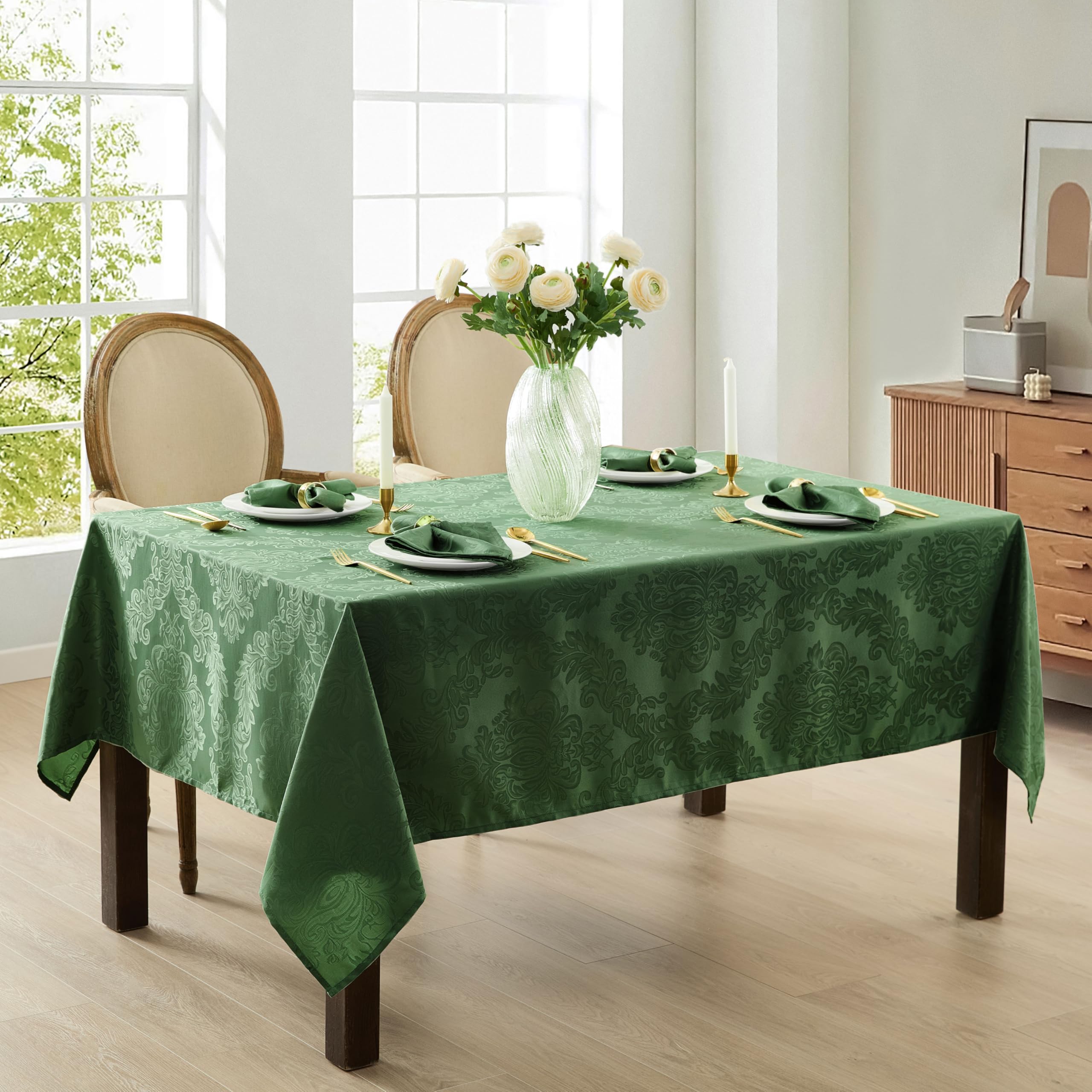Newbridge Barcelona damask tablecloth folded-edge detail highlights easy-care finish.
