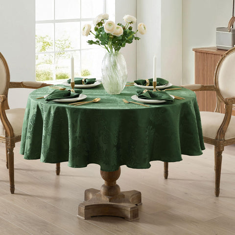 Indoor dining setup with Newbridge Barcelona damask tablecloth rounds out a cohesive tablescape