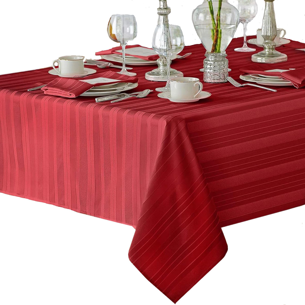 Newbridge Christmas red satin stripe tablecloth on 52x70 rectangle for holiday hosting.