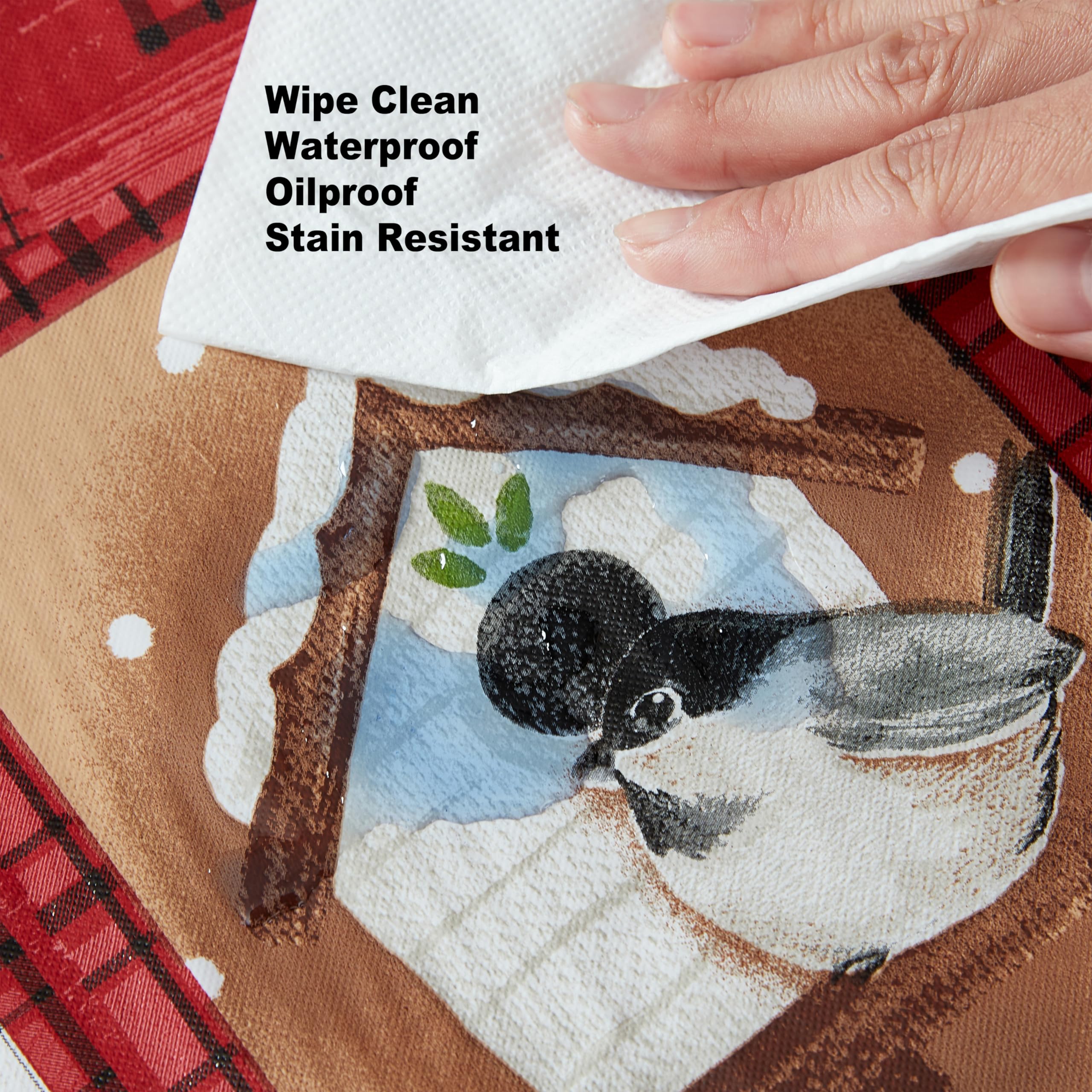 Newbridge Holiday Forest Friends tablecloth with flannel backing visible.