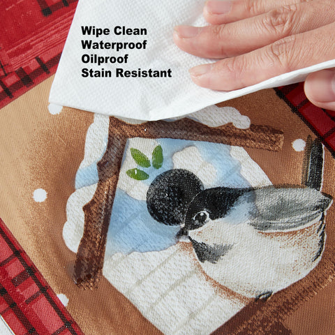 Newbridge Holiday Forest Friends tablecloth with flannel backing visible.