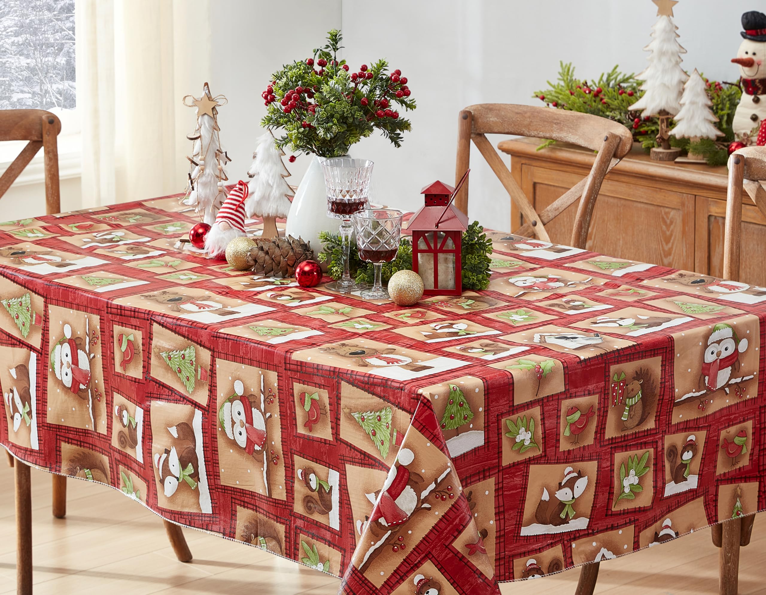 Newbridge Holiday Forest Friends tablecloth vinyl surface appears stain-resistant and wipeable.