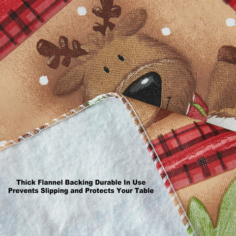 Newbridge Holiday Forest Friends tablecloth on wooden table with woodland scene.