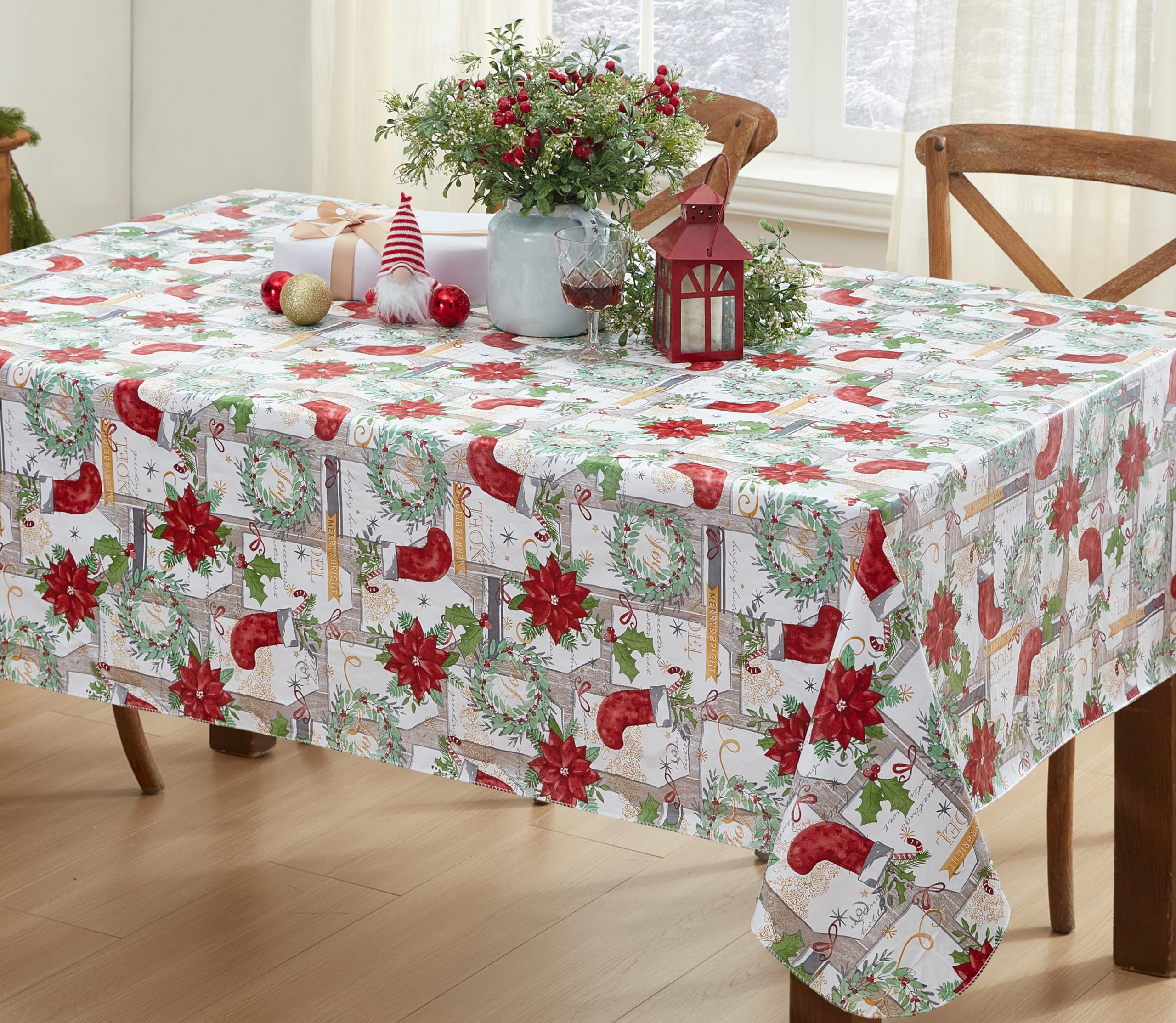 Newbridge Merry Christmas tablecloth with wreaths and poinsettias for gatherings.