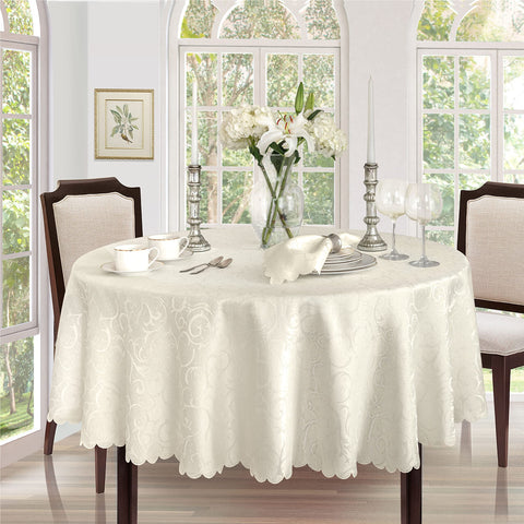 Newbridge Portofino ivory tablecloth, 70-inch round, ideal for elegant holiday entertaining.
