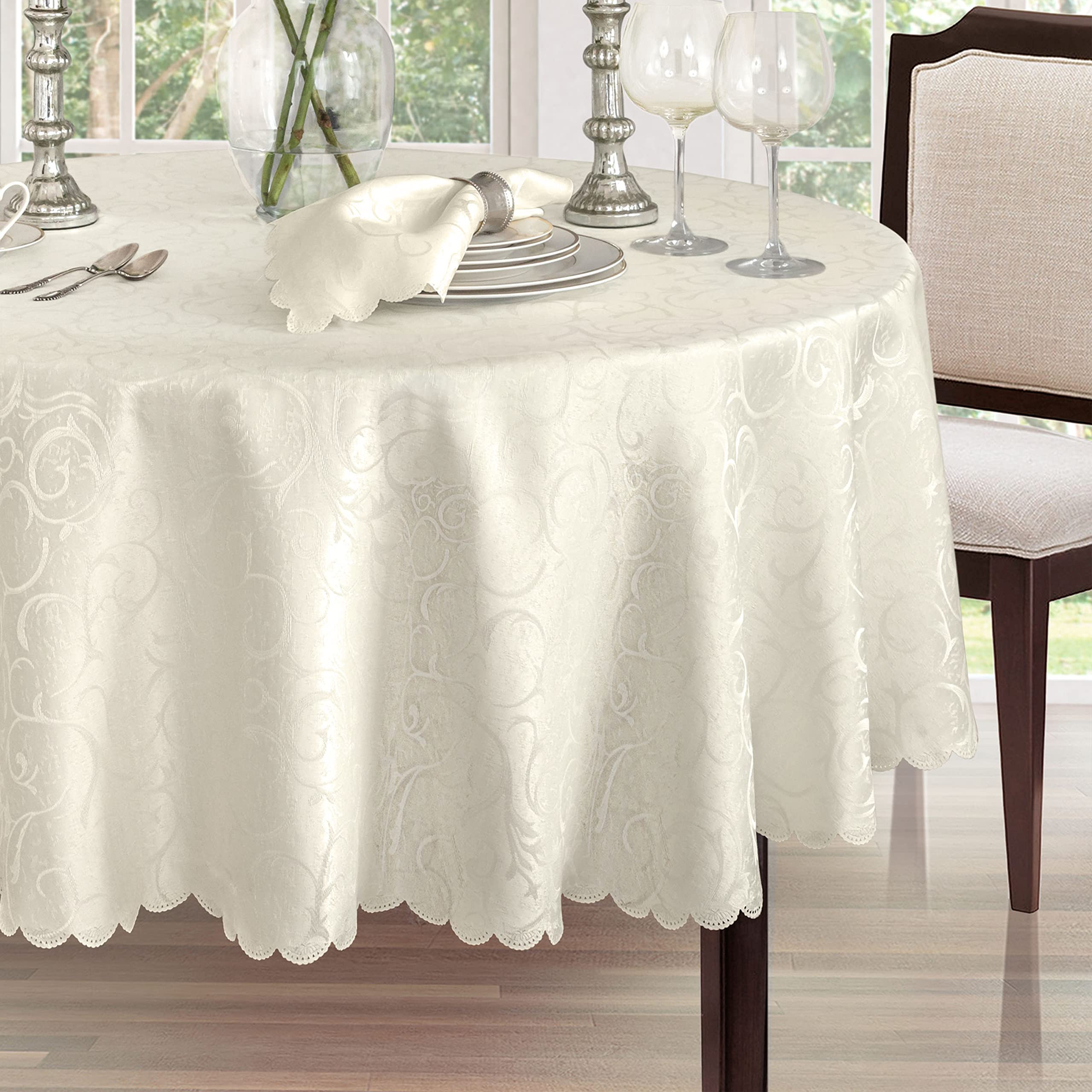 Newbridge Portofino wrinkle-free finish visible on ivory fabric for pristine tables.