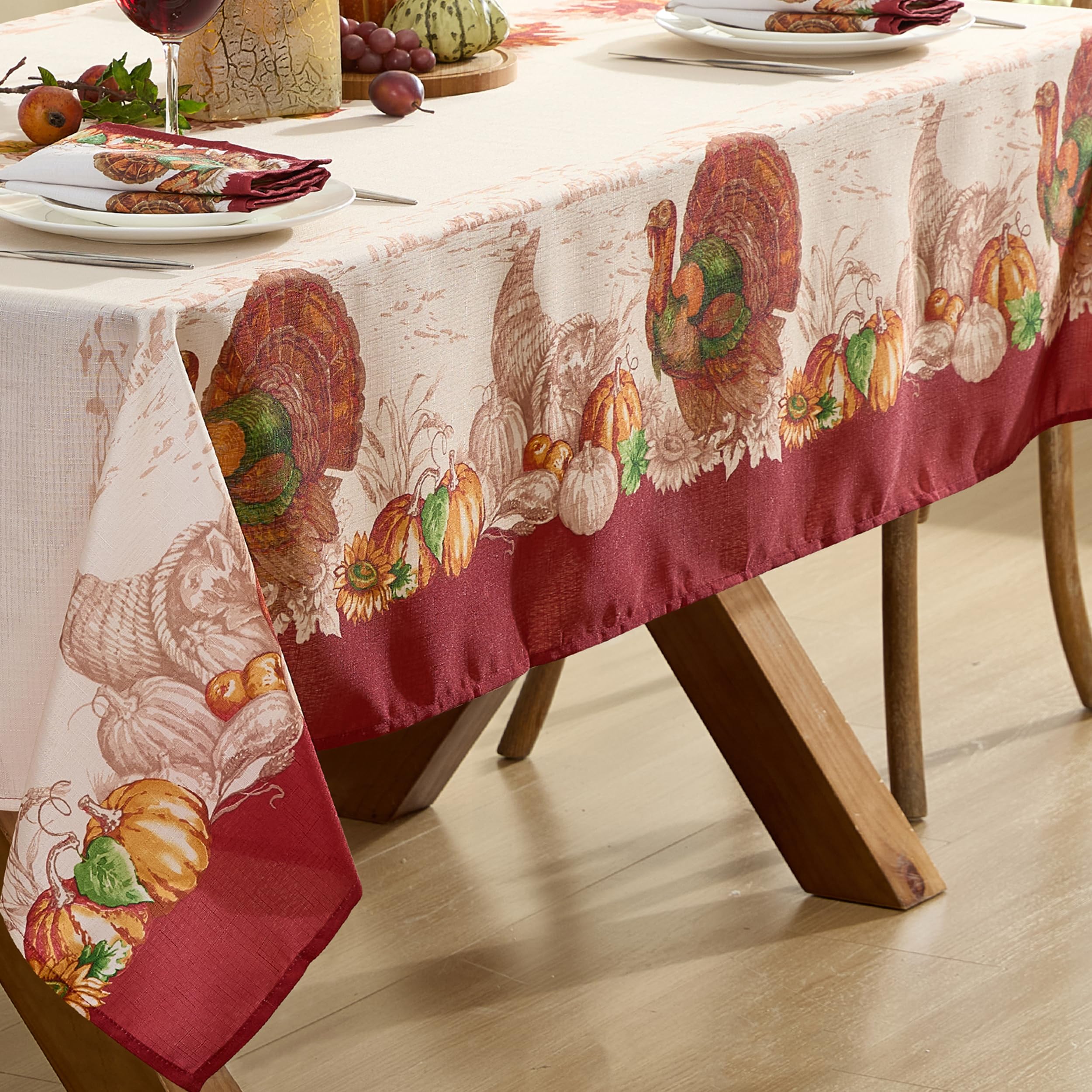 Newbridge tablecloth showcases pumpkins and leaves border, adding seasonal warmth.