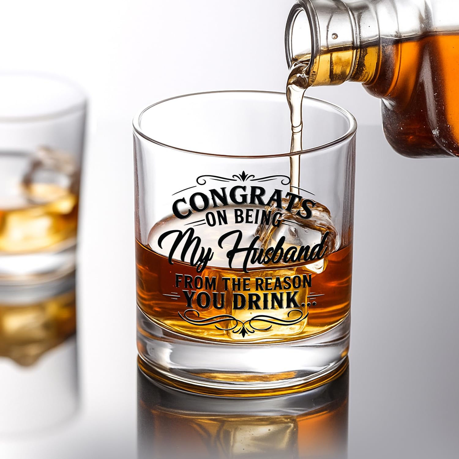 NewEleven whiskey glass in hand elevates a thoughtful husband gift moment