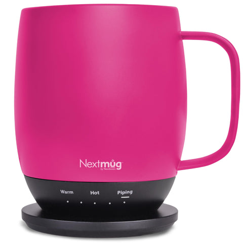 Nextmug True Pink 14 oz on desk maintains beverage temperature for busy mornings.