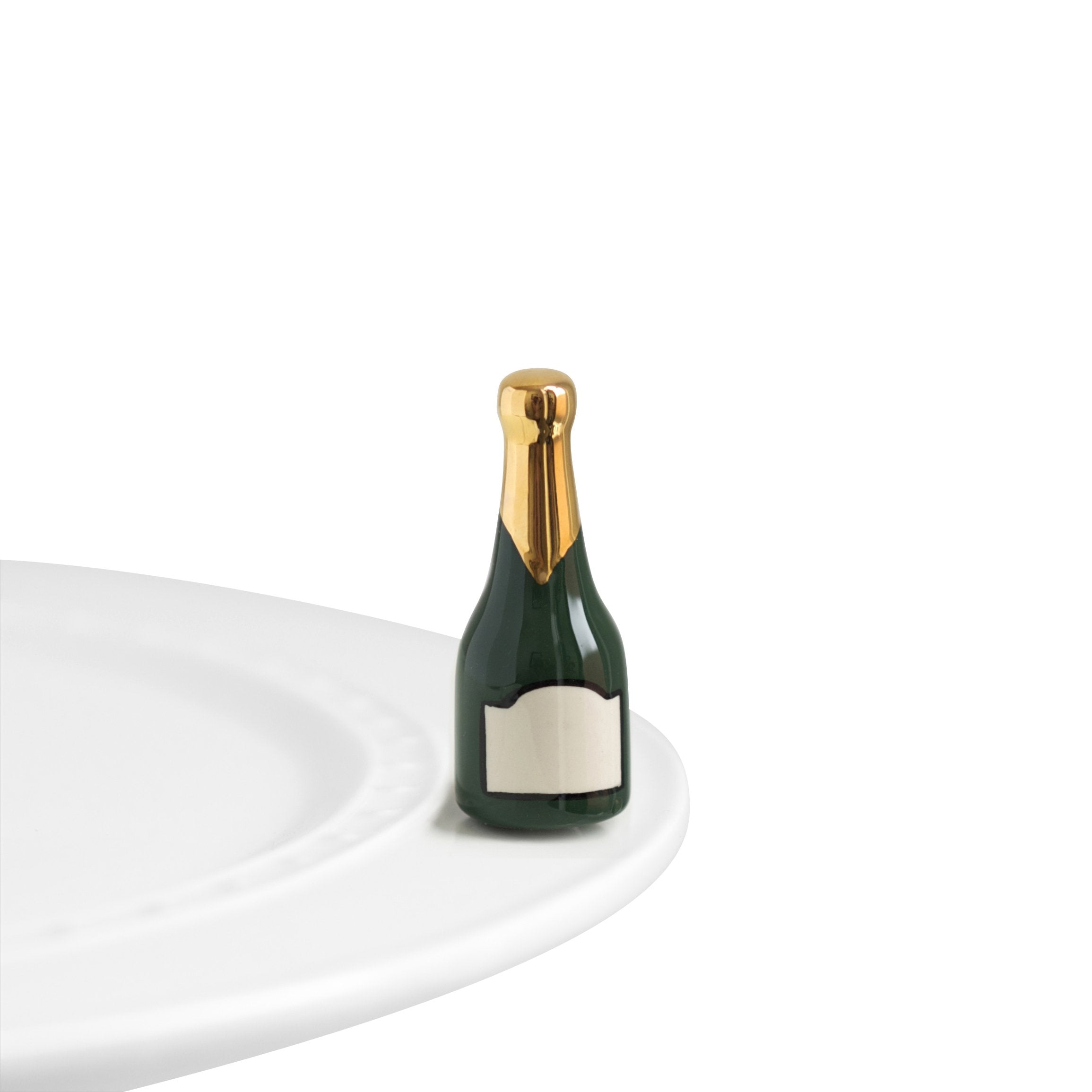 Nora Fleming champagne bottle mini with a hand-painted finish for elegant table decor.