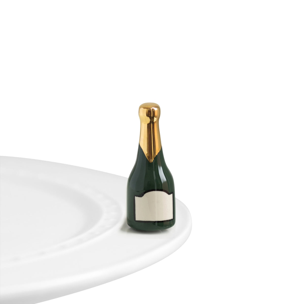 Nora Fleming champagne bottle mini with a hand-painted finish for elegant table decor.