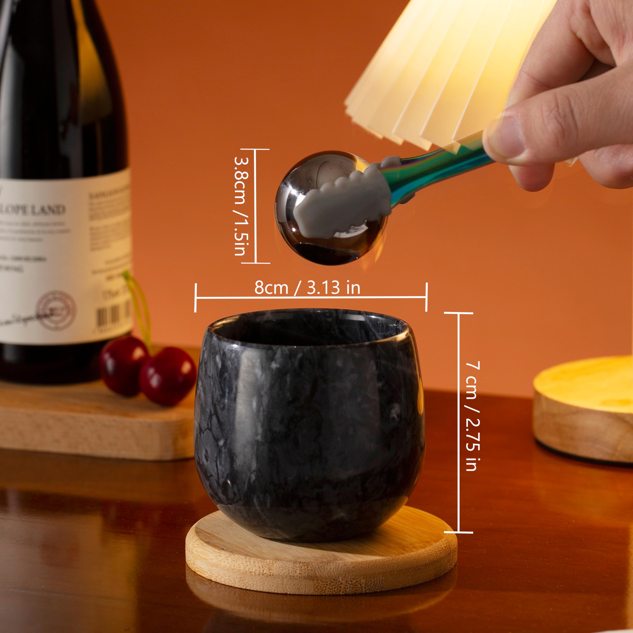 NHKRTE marble whiskey glass side view highlighting ergonomic grip for easy sipping