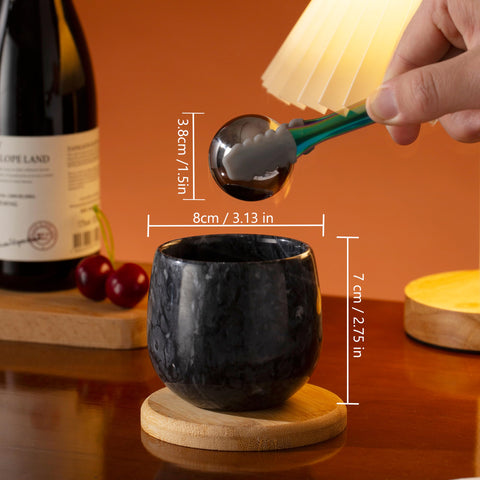 NHKRTE marble whiskey glass side view highlighting ergonomic grip for easy sipping