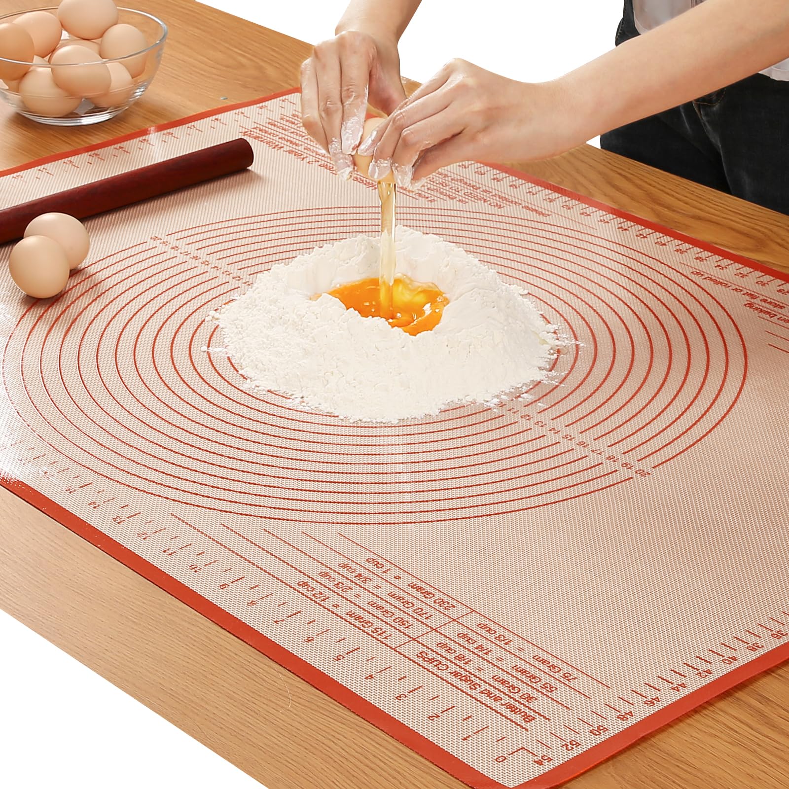 Close-up of dough rolling with measurement marks for precise, even pastry sheets.
