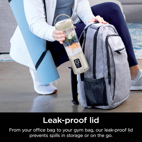 Ninja Blast sip lid with hinge enables easy drinking while blending.