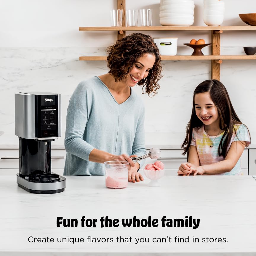 Outer bowl and lid of the Ninja CREAMi secured for processing.