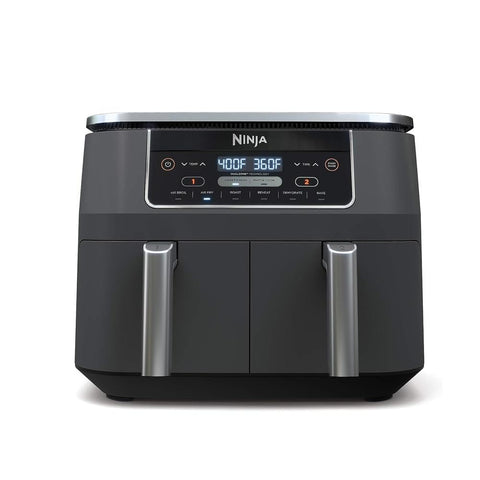 Ninja DZ201 dual-zone baskets show two independent compartments for two foods at once.