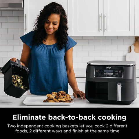 Ninja DZ201 two foods at once feature demonstrated by separate baskets cooking different items.