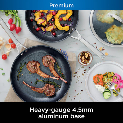 Ninja NeverStick stainless steel handles provide secure grip and durability.